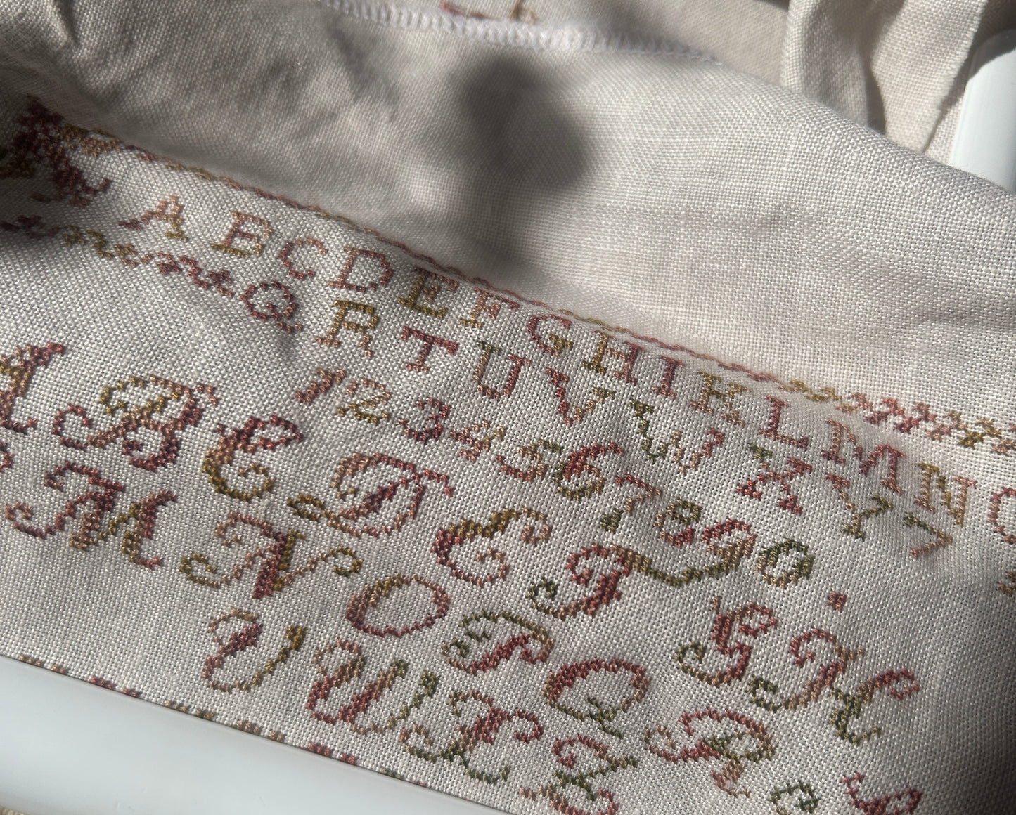 Golden Child - Sampler Reproduction by The Stitchery Sisters