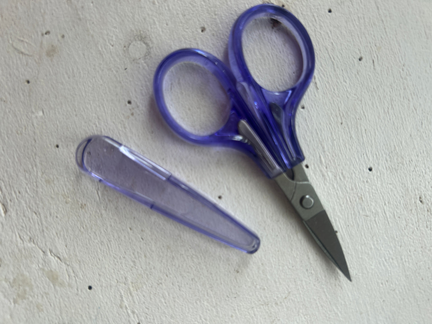 Curved lavender embroidery scissors